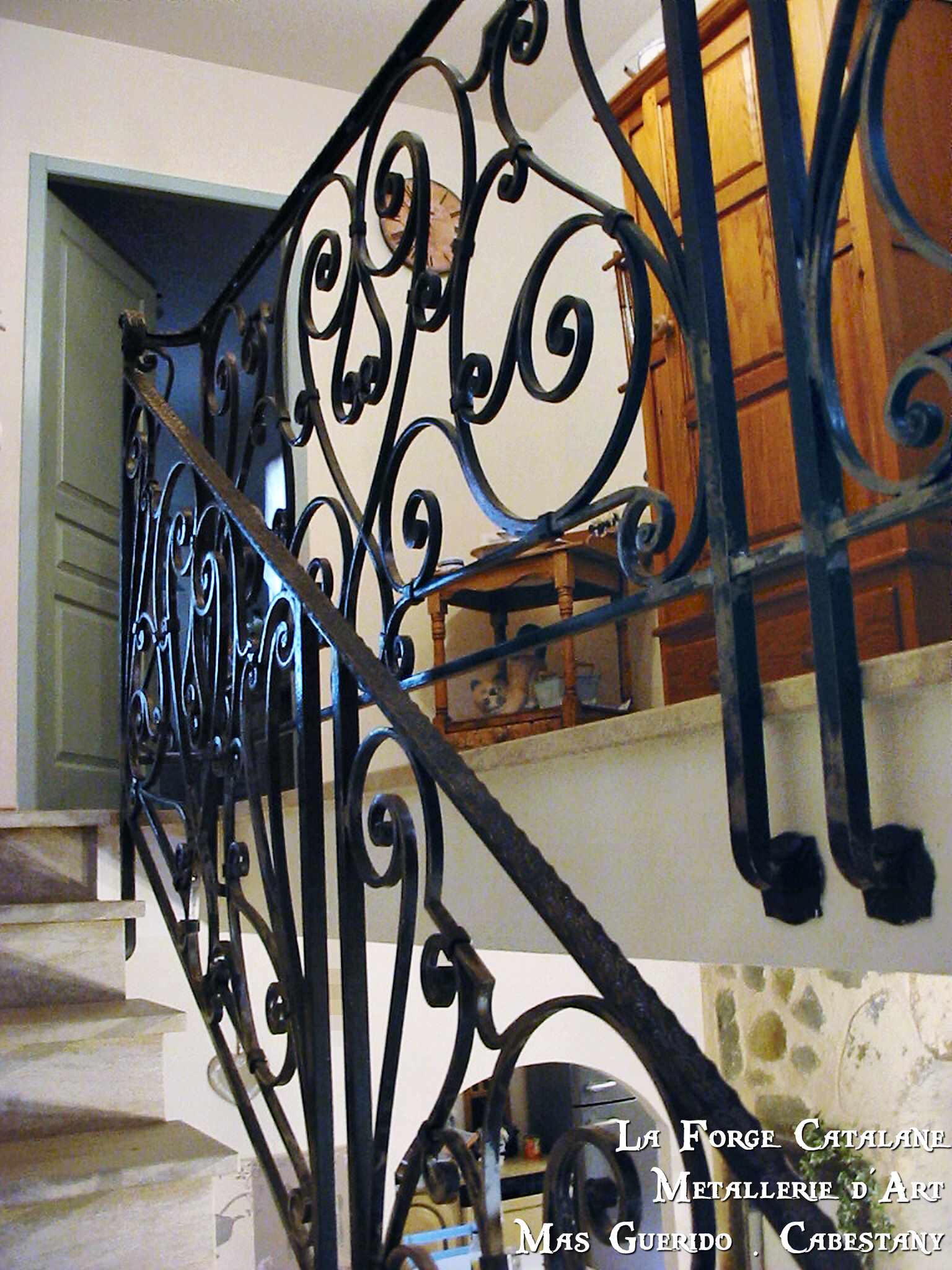 Rampant volutes main courante ouvrage forge catalane 3.jpg